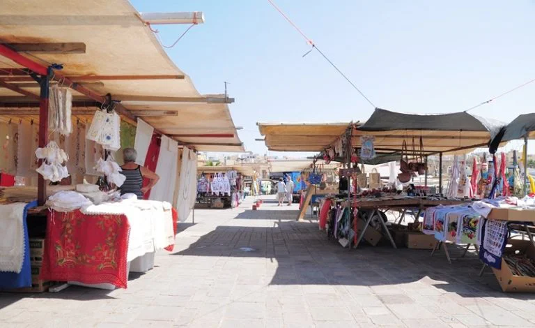 Market stalls along the waterfront at Marsaxlokk